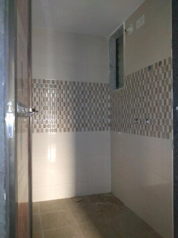 Bathroom in 1 BHK Apartment at Dharti Orange Heights, Morya Nagar – for Rent