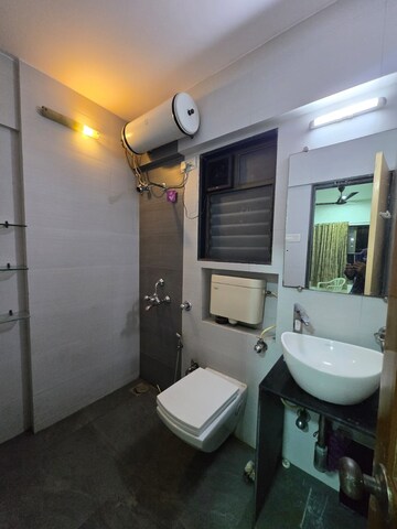 Bathroom in 2 BHK Apartment at Bhoomi Rock Enclave, Kandivali West – for Rent