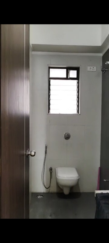 Bathroom in 2 BHK Apartment at Harmony Signature Towers, Owale – for Sale