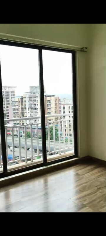 Room in 2 BHK Apartment at Harmony Signature Towers, Owale – for Sale