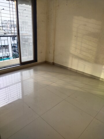 Room in 2 BHK Apartment at Shri Ambe Vinayak Ashirwad, Karanjade – for Rent