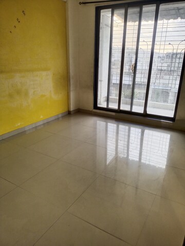 Room in 2 BHK Apartment at Shri Ambe Vinayak Ashirwad, Karanjade – for Rent