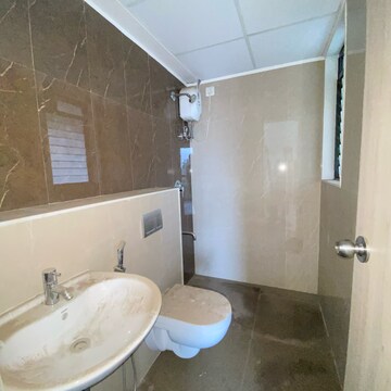 Bathroom in 2 BHK Apartment at Lodha Palava City Lakeshore Greens, Hedutane – for Rent