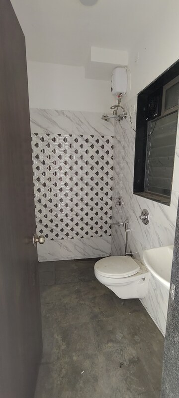 Bathroom in 2 BHK Apartment at UK Iridium, Kandivali East – for Rent