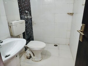 Bathroom in 5 BHK Apartment at Ambience Caitriona, Sector 24 – for Sale