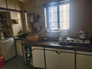 Kitchen in 2 BHK Apartment at Shreeji Apartment Andheri, Andheri West – for Rent
