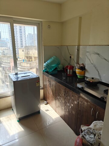 Kitchen in 1 BHK Apartment at Ruparel Elara, Kandivali West – for Rent