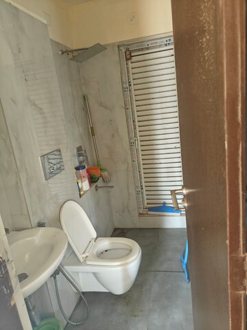 Bathroom in 1 BHK Apartment at Ruparel Elara, Kandivali West – for Rent