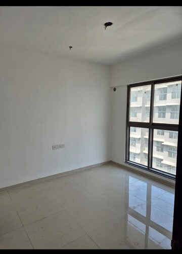 Master Bedroom in 2 BHK Apartment at UK Iridium, Kandivali East – for Rent