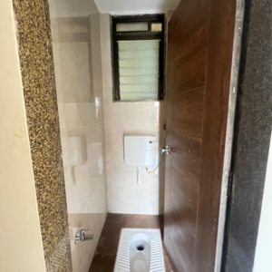 Bathroom in 1 BHK Apartment at Sai Raj Flora, Ambivali – for Sale
