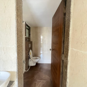 Bathroom in 1 BHK Apartment at Sai Raj Flora, Ambivali – for Sale