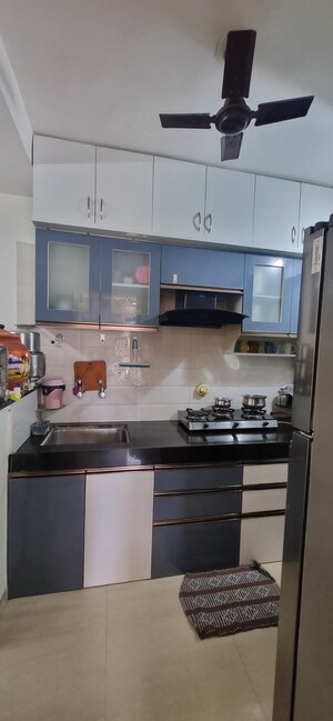 Kitchen in 4 BHK Apartment at RSG Durvankur Residency, Wagholi – for Sale