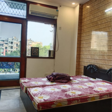 Bedroom in 3 BHK Builder Floor at Boutique Residential Apartments C-220, Sarvodaya Enclave – for Rent