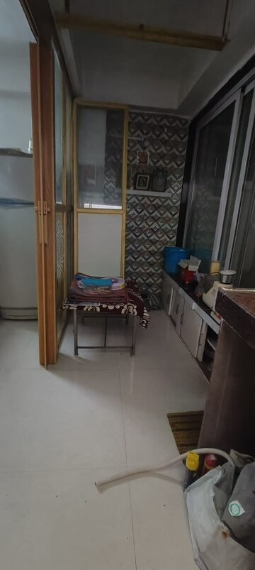 Living Room in 1 BHK Apartment at Hill Garden, Manpada – for Rent