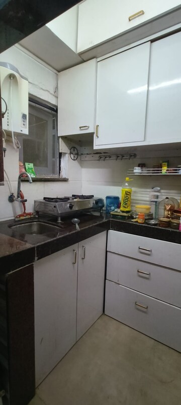Kitchen in 1 BHK Apartment at Hill Garden, Manpada – for Rent