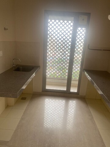 Kitchen in 2 BHK Apartment at Piramal Vaikunth Vraj, Balkum Pada – for Rent
