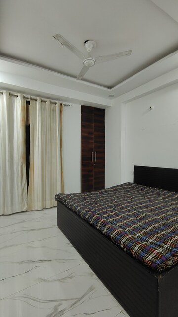 Bedroom in 2 BHK Builder Floor at Palm Residency Chhatarpur, Chattarpur – for Rent