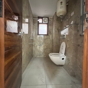 Bathroom in 3 BHK Builder Floor at Chattarpur – for Sale