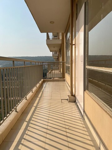 Balcony in 2 BHK Apartment at Breez Global Heights, Sohna Sector 33 – for Rent