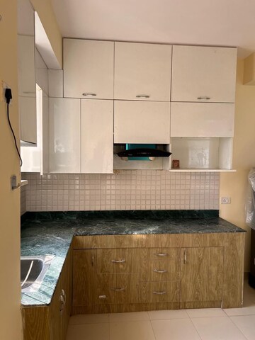 Kitchen in 2 BHK Apartment at Breez Global Heights, Sohna Sector 33 – for Rent