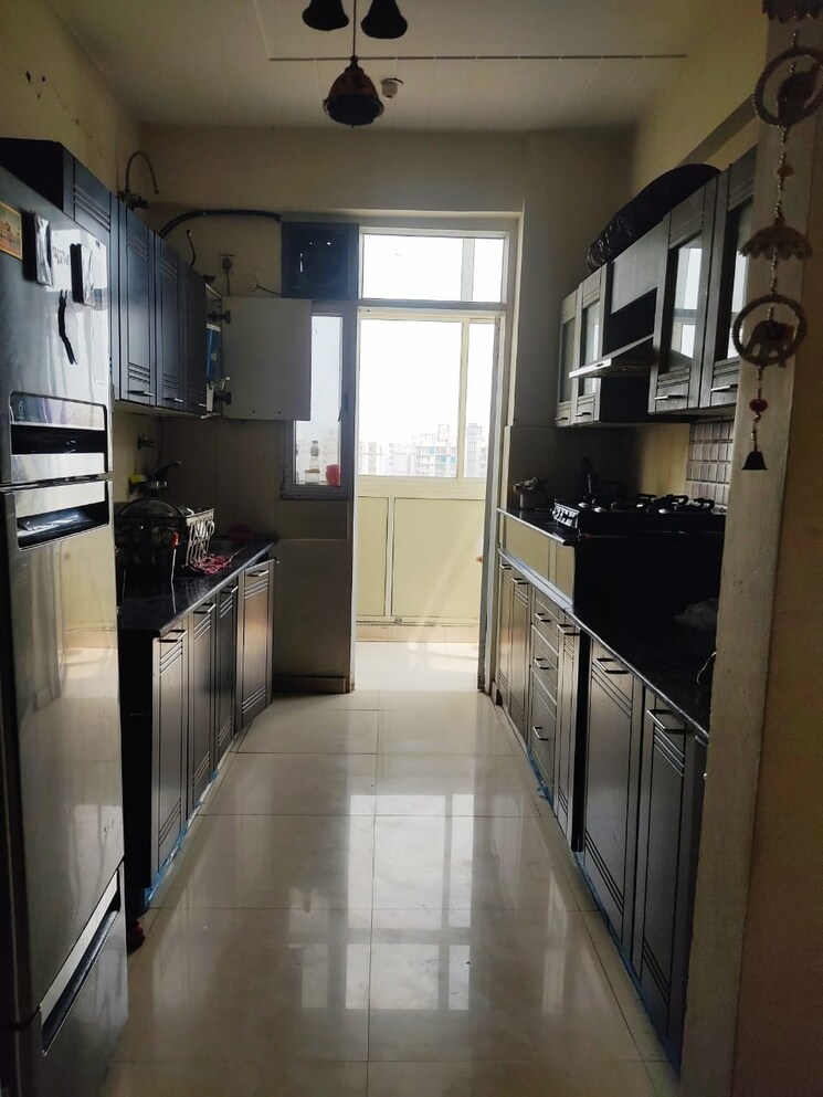 Kitchen, sikka-karmic-greens 3.5 Bedroom 1510 Sq.Ft. Apartment In Sector 78 Noida 9175523