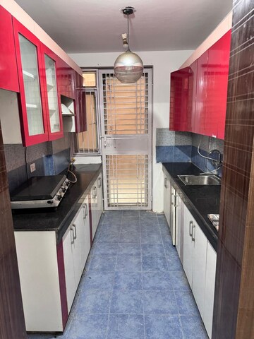 Kitchen in 3 BHK Apartment at Amrapali Crystal Homes, Sector 76 – for Rent