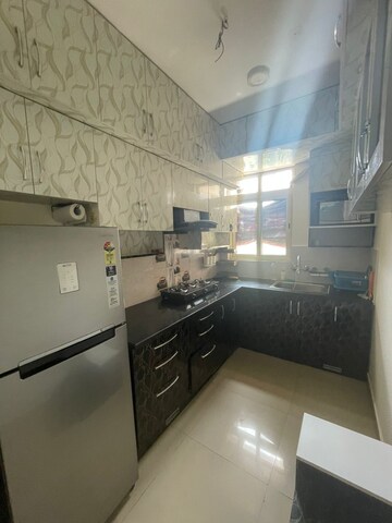 Kitchen in 2 BHK Apartment at Suncity Avenue 102, Sector 102 – for Rent