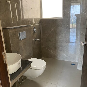 Bathroom in 4 BHK Apartment at Artique Uptown Skylla, International Airport Road – for Rent