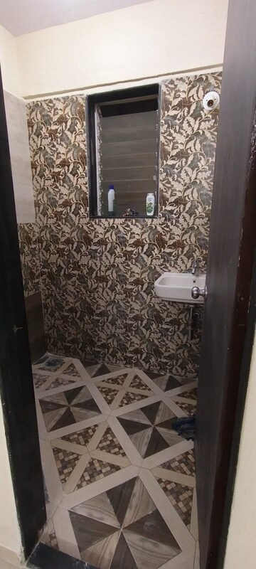 Bathroom in 1 BHK Apartment at Shraddha Evoque, Bhandup West – for Rent