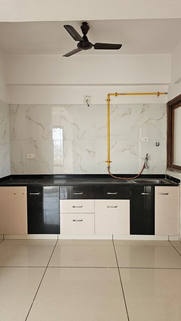 Kitchen in 3 BHK Apartment at Kavisha C3 Celebration City Center, South Bopal – for Rent