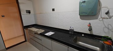Kitchen in 2 BHK Apartment at Om Shivshakti CHS, Malad East – for Rent