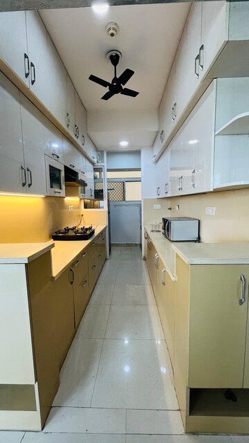 Kitchen in 3 BHK Apartment at Great Value Sharanam, Sector 107 – for Rent