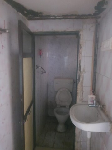 Bathroom in 1 BHK Apartment at Ganesh CHS Kalwa, Kalwa – for Rent