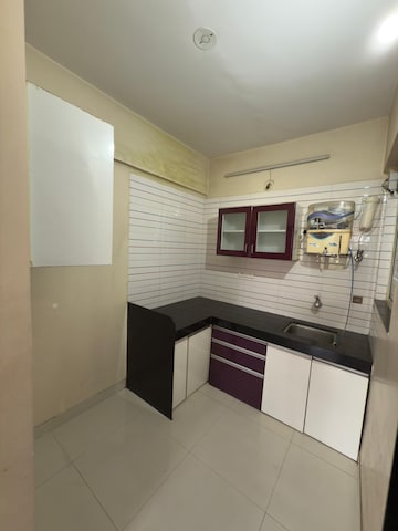 Kitchen in 2 BHK Apartment at Mangal Shanti Mansha, Wagholi – for Sale