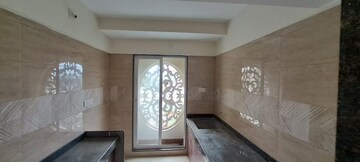 Kitchen in 2 BHK Apartment at Tharwani Vedant Imperial Villas, Badlapur West – for Rent