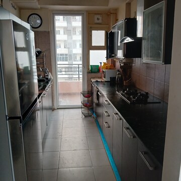Kitchen in 3 BHK Apartment at Puri Pranayam, Sector 82 – for Rent