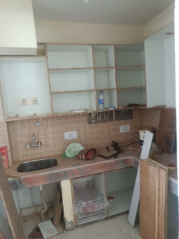 Kitchen in 2 BHK Apartment at Raj Nagar Extension – for Rent