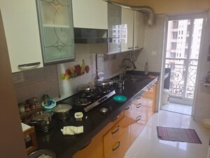 Kitchen in 2.5 BHK Apartment at Rosa Oasis, Ghodbunder Road – for Sale