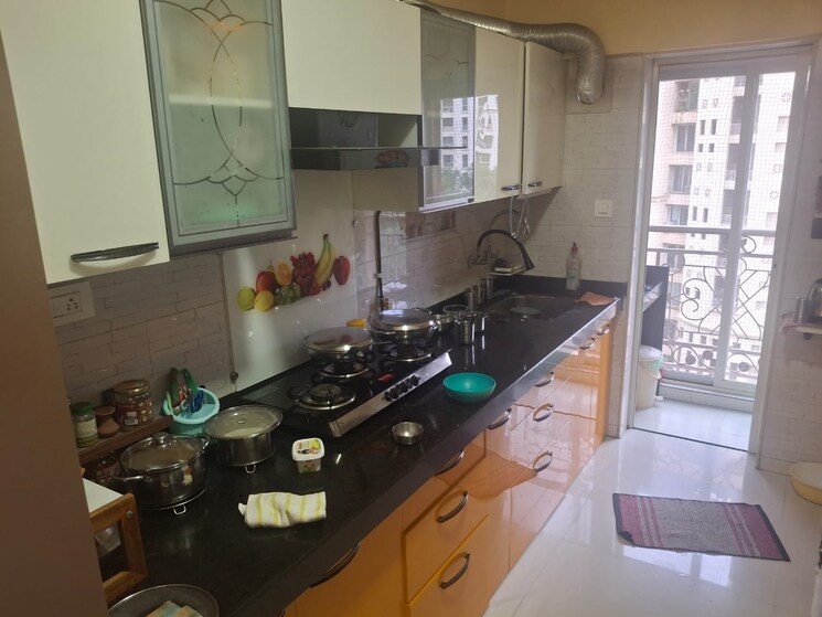 Kitchen, rosa-oasis 2.5 Bedroom 760 Sq.Ft. Apartment In Ghodbunder Road Thane 9176320