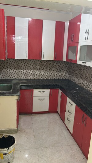 Kitchen in 3 BHK Apartment at SVP Gulmohur Garden, Raj Nagar Extension – for Sale