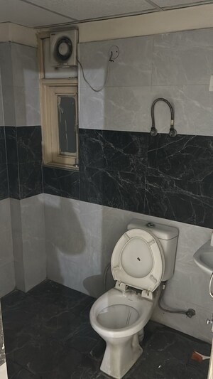 Bathroom in 3 BHK Apartment at SVP Gulmohur Garden, Raj Nagar Extension – for Sale