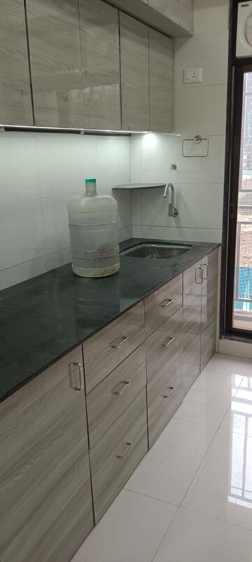 Kitchen in 1 BHK Apartment at Ravi Gaurav Excellency, Mira Road – for Rent
