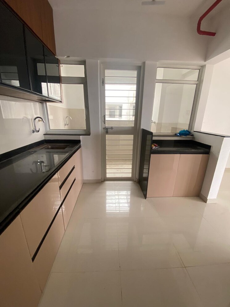 Kitchen, krisala-41-cosmo 2 Bedroom 738 Sq.Ft. Apartment In Tathawade Pune 9176466