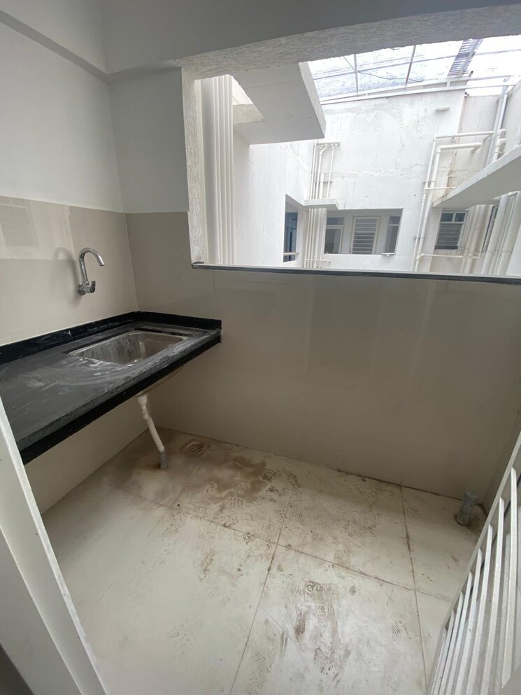 Kitchen, krisala-41-cosmo 2 Bedroom 738 Sq.Ft. Apartment In Tathawade Pune 9176466