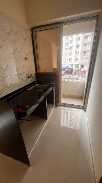 Kitchen in 2 BHK Apartment at JP North Barcelona, Mira Road – for Rent