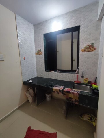 Kitchen in 1 BHK Apartment at Happy Home Siddhachal, Dombivli East – for Rent