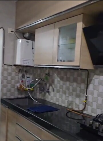 Kitchen in 2 BHK Apartment at Sai Nagar CHS, Kalamboli – for Rent