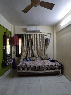 Bedroom in 1 BHK Apartment at Omkar Apartment Kharegaon, Kalwa – for Sale