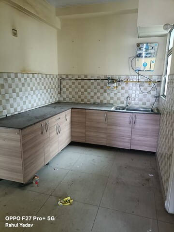 Kitchen in 2.5 BHK Apartment at Gaur City 2 - 11th Avenue, Sector 16c Greater Noida – for Rent