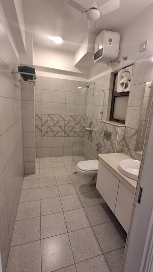 Bathroom in 2 BHK Apartment at Ashiana Tarang, Sector 24 – for Sale